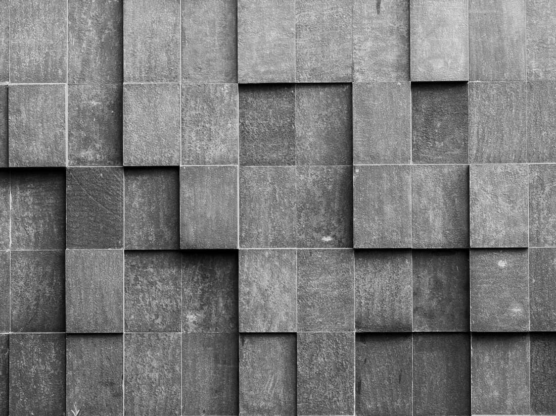 A solid stone building facade